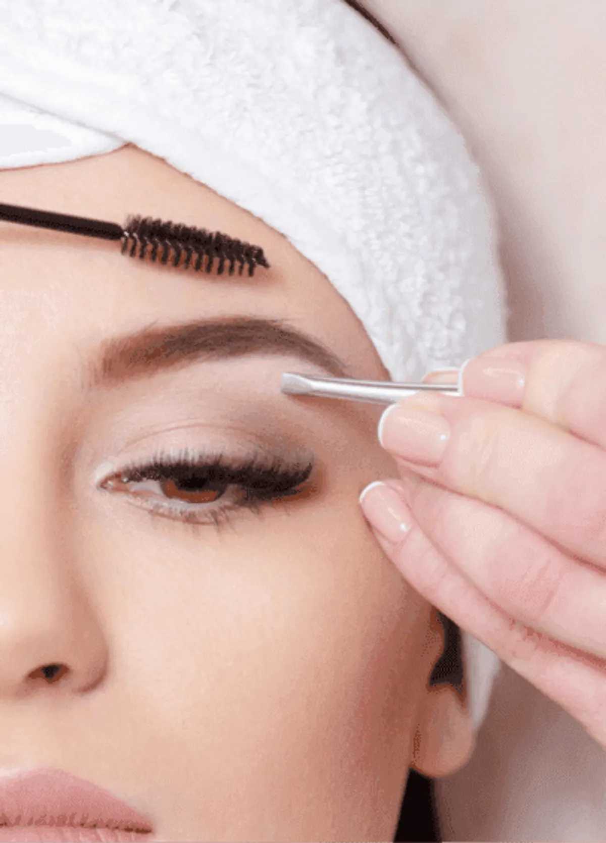 Confident patient portrait after brow lamination at Eternal Wellness Traverse City