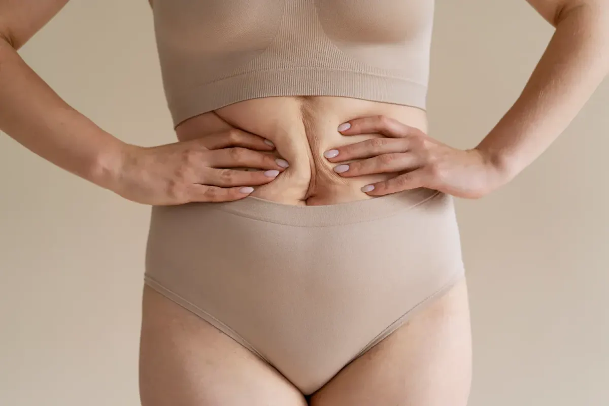Confident patient portrait after hyperhidrosis treatment at Eternal Wellness Traverse City