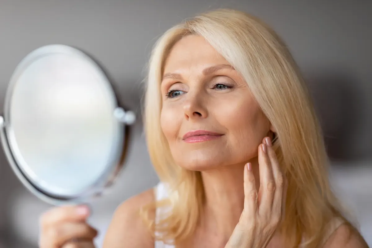 Person concerned about dark spots and uneven skin tone at Eternal Wellness Medical Spa Traverse City