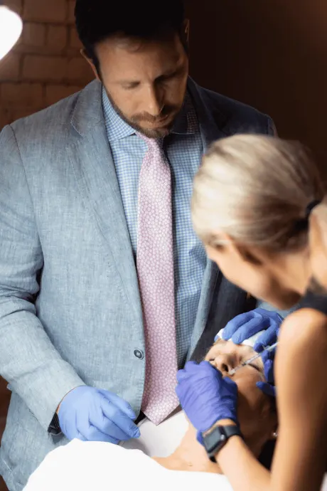 Patient consultation for lip injections at Eternal Wellness Medical Spa Traverse City