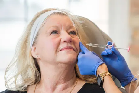 Patient consultation for dermal fillers at Eternal Wellness Medical Spa Traverse City