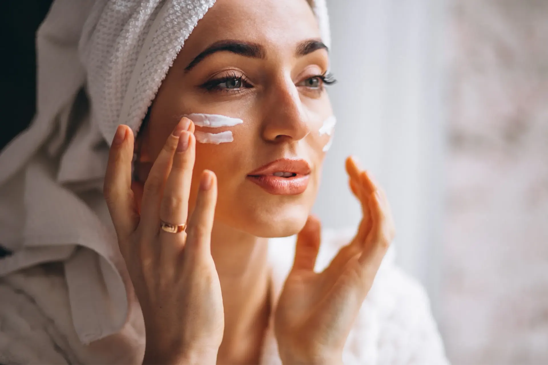 Patient receiving a personalized skin care diagnostic consultation at Eternal Wellness Medical Spa in Traverse City, MI