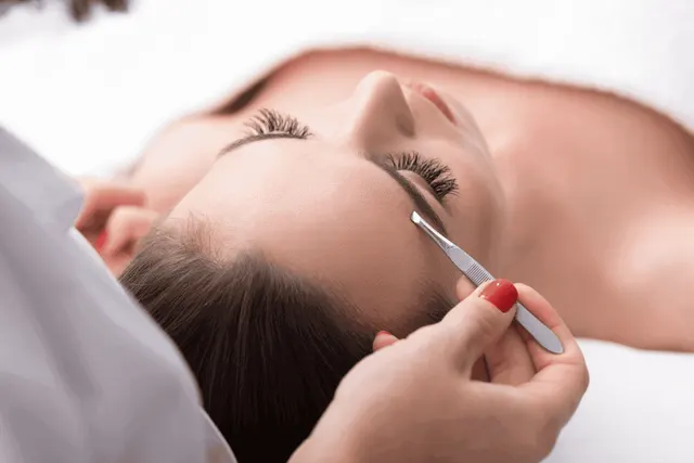 Before and after brow lamination results showing fuller brows at Eternal Wellness Traverse City
