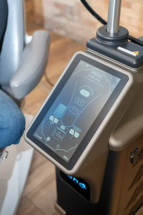 Patient consultation discussing Toro Laser treatment benefits at Eternal Wellness Medical Spa