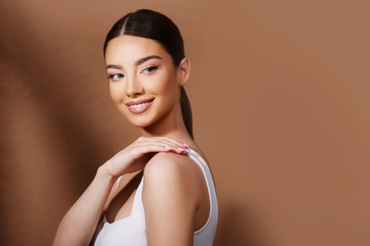 Person considering professional hair removal options at Eternal Wellness Medical Spa Traverse City