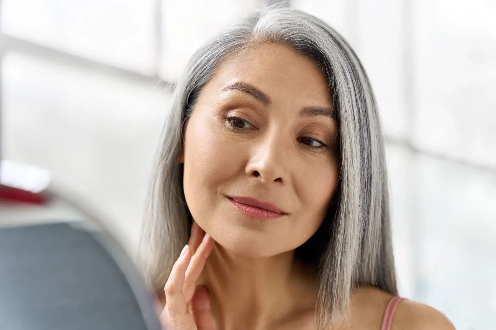 Diagram showing collagen and elastin degradation in aging skin at Eternal Wellness Medical Spa